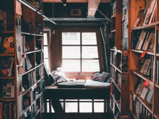 Cozy corner of a Seattle bookstore surrounded by shelves of books.