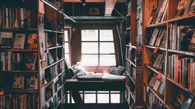 Cozy corner of a Seattle bookstore surrounded by shelves of books.